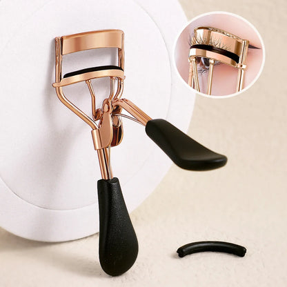 Blushimmer portable eyelash curler with stainless steel body and 15 silicone pads for eyelash extension and curling.