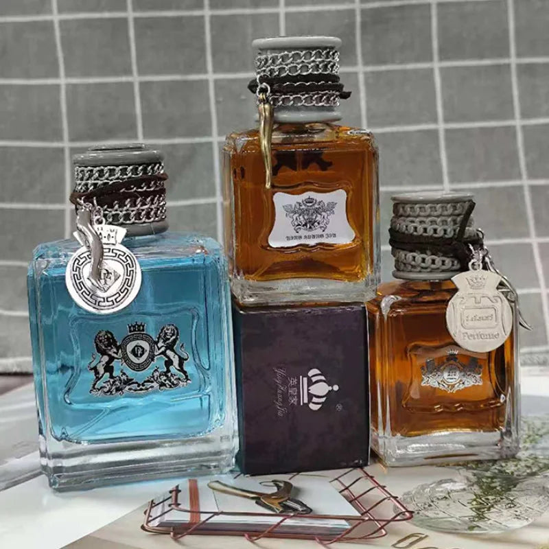 Blushimmer Charm Unleashed Cologne bottle featuring woody, citrus, and vitality notes in a sleek perfume design for men.