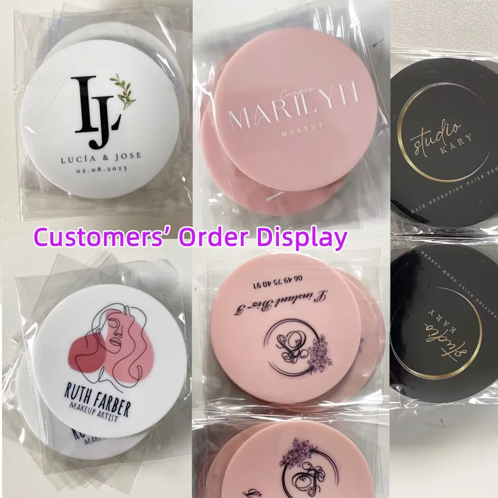 Round pocket mirror with custom logo, pink, red, white, and black design, ideal as personalized wedding souvenir gift by Blushimmer