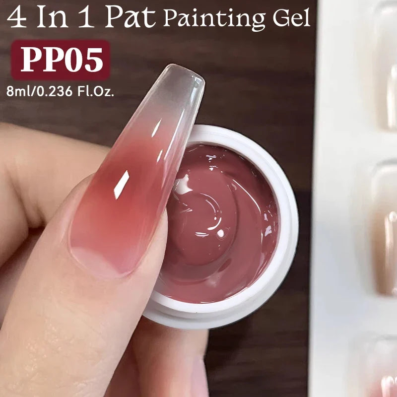 Blushimmer UR Sugar 4-in-1 nude pink gel nail polish for gradient, cover edge, and nail art stamping on a hand with decorated nails.