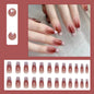 Set of 24 Y2K star press-on nails by Blushimmer featuring gradient black color, moon designs, and mid-length coffin shape.