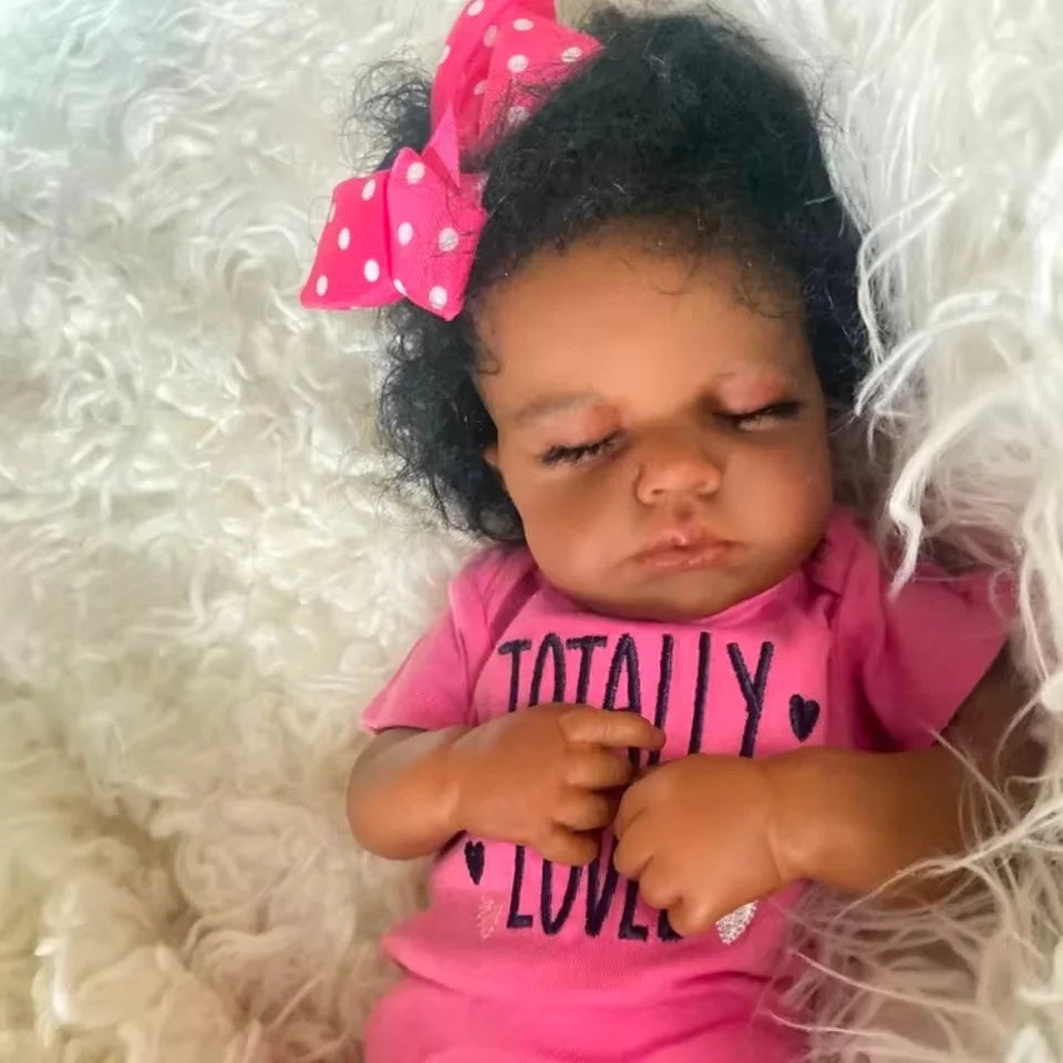 Lifelike black Reborn baby doll by Risbecko, 20 inches, soft cloth body, African American, realistic features, ideal gift for special occasions