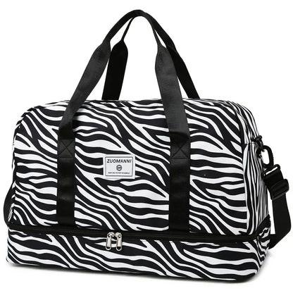 OBA women's zebra print carry-on travel bag with durable duffel bag design for gym and travel use.