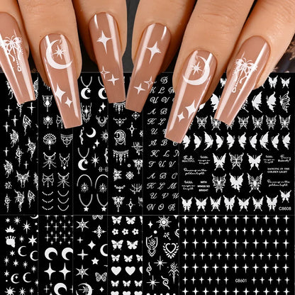 12-piece set of Blushimmer cartoon dog and cat nail art stickers with 3D graffiti design on black backgrounds, self-adhesive and decorative.