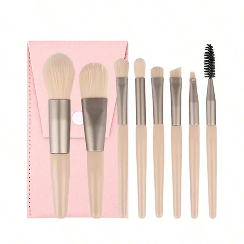 Set of 13 Blushimmer makeup brushes with soft bristles for eyeshadow, foundation, blush, and beauty applications, in a convenient cosmetic bag.