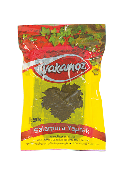 S101 Yakamoz Grape Leaves 500g in a clear jar, showing fresh, rolled grape leaves used for Mediterranean dishes.