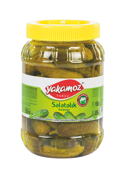 Glass jar of S101 Yakamoz cucumber pickles, 1500g, showing fresh sliced cucumbers in brine inside the jar.