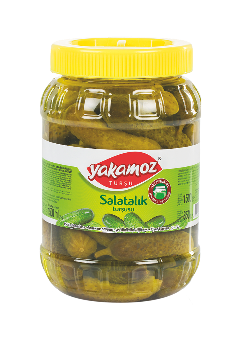 Glass jar of S101 Yakamoz Cubuk Pickle with fresh cucumbers and brine, ready for serving or storage.
