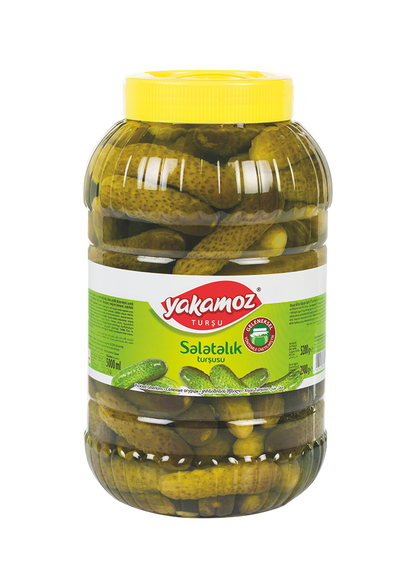 S101 Yakamoz cucumber pickle in a glass jar, 5200g, with fresh sliced cucumbers visible inside the jar.