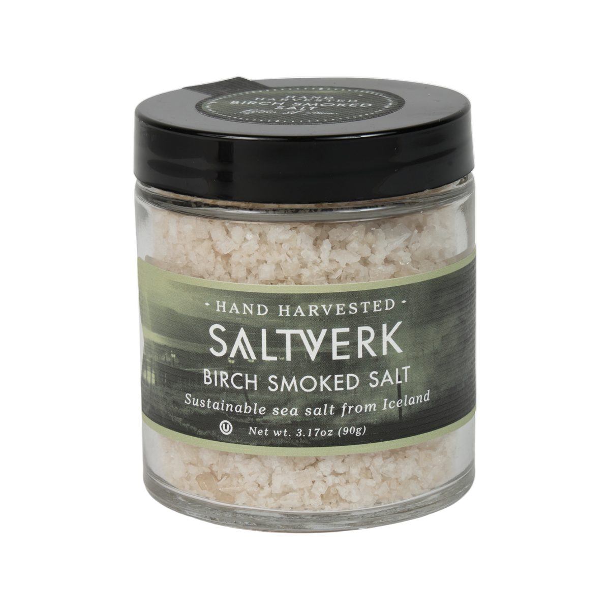 Saltverk birch smoked salt crystals in a glass jar, showcasing the artisanal salt with a smoky flavor and natural wood infusion.
