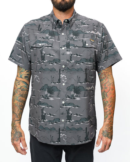Dark grey San Saba SS shirt by Off The Grid Surplus, short sleeve button-up style with a casual, rugged look.
