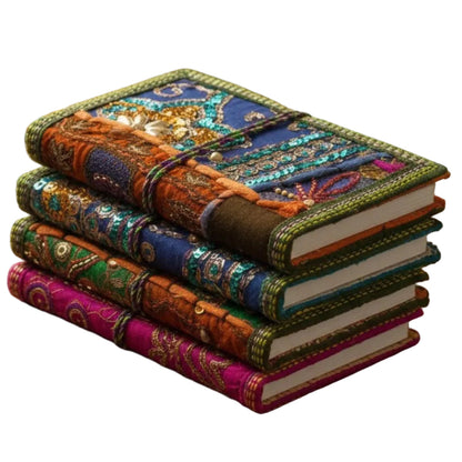 Handcrafted sari fabric bound notebook journal with colorful sari patterns, ideal for home decor or personal writing.