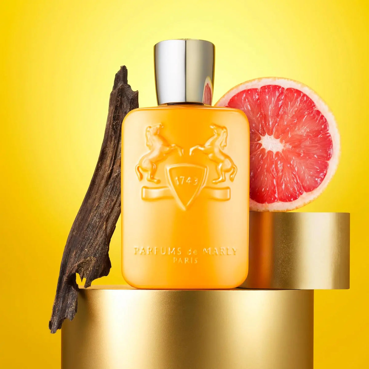 Parfums De Marly Perseus Eau De Parfum bottle from Blushimmer, featuring a blue, brown, and yellow gradient design.