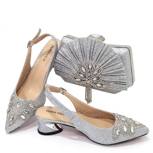Silver women's mid heels and matching frosted crystal shoes and bag set by EdleessFashion, elegant footwear and accessories.