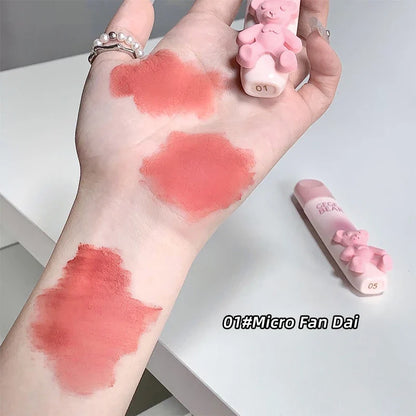 Blushimmer cute bear lip glaze and matte velvet lipstick with lip cream, showing colorful lip makeup and packaging.