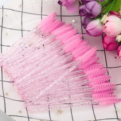 Set of 50 eyelash and eyebrow brushes by Blushimmer, including mascara wands and applicators for false eyelash extensions.