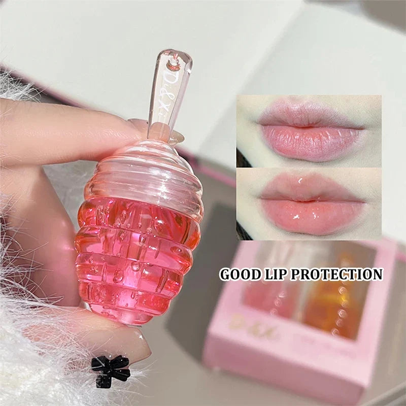 Blushimmer Kleines Honeypot Lippenöl with water-based moisturizing formula and subtle lip pattern for soft, hydrated lips.
