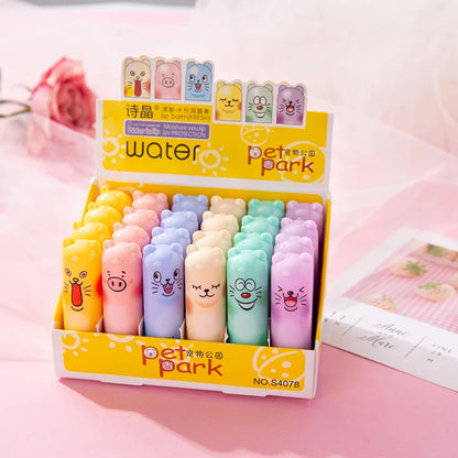 Set of 24 Blushimmer bear-shaped clear fruit-flavored lip balms for kids, moisturizing and perfect for party or birthday gifts.