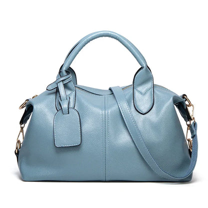 OBA women's large capacity oil wax leather tote bag with shoulder straps, showcasing its spacious design and textured leather finish.