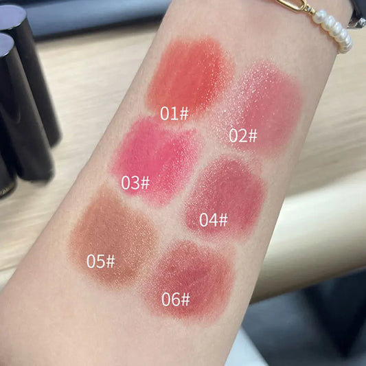 Blushimmer waterproof brown and red lipstick with moisturizing gloss, natural finish, long-lasting makeup, shown with mirror.