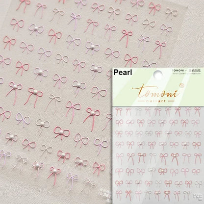 White and black nail art stickers featuring French leopard print, rhinestones, pearls, and bowknot lace ribbon for manicure decoration.