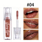 Blushimmer Hydrating Crystal Lip Oil in a tinted gloss tube, showing a clear, shiny lip gloss with a hint of color and plumping effect.