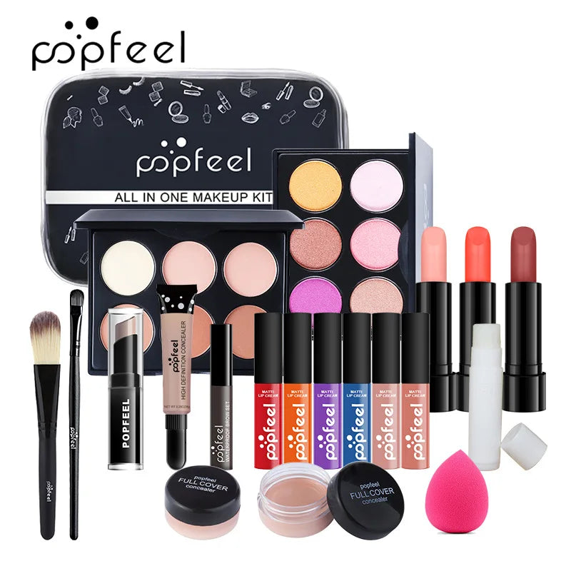 Blushimmer all-in-one makeup kit with eyeshadow palette, foundation, lip gloss, blush, brushes, and eyeliner in a mixed color paste set.