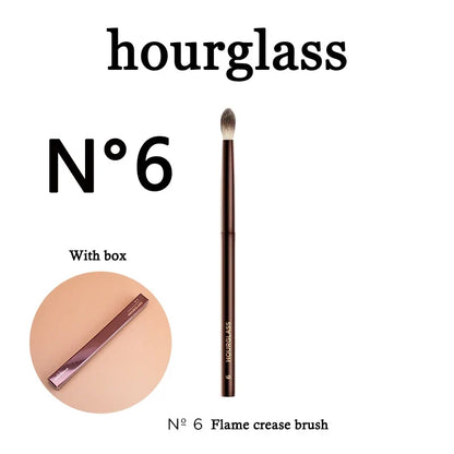 Blushimmer seamless finish concealer brush with angled design for precise application of liquid and cream concealers on face.