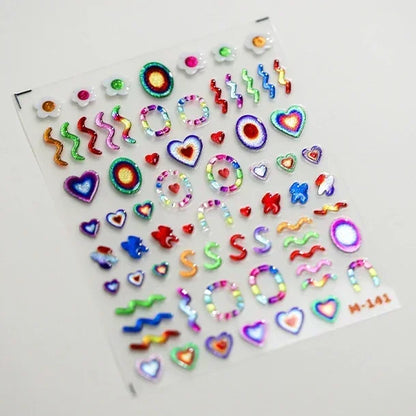 Colorful Cat's Eye 5D Gradient European Love Heart Gem nail art stickers with wing and geometric design for manicure decoration.
