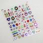 Colorful Cat's Eye 5D Gradient European Love Heart Gem nail art stickers with wing and geometric design for manicure decoration.