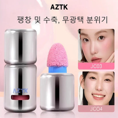 Blushimmer AZTK liquid blush in JC04 shade, featuring moisturizing, long-lasting cheek makeup with a smooth, natural finish.