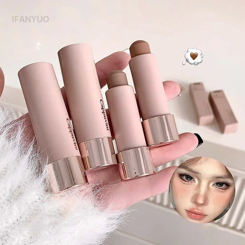 Gray and brown bronzer contouring stick by Blushimmer with waterproof, creamy texture for face shaping and concealing.
