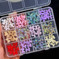 Assorted 3D gold bow, butterfly, and star nail metal charms on a white background for luxury nail art designs.