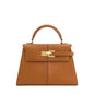 OBA women's brown crossbody handbag with sleek satchel design, featuring a smooth finish and adjustable strap.