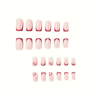 Red heart-shaped artificial nails set with 24 pieces and a cuticle pusher from Blushimmer, perfect for a stylish nail upgrade.