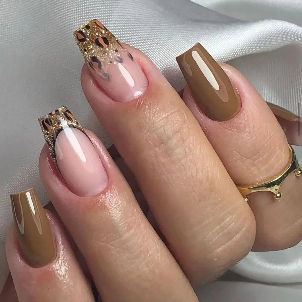 Blushimmer 3D bowknot pearl leopard French nude almond false nails with detachable press-on style for fashionable nail art.