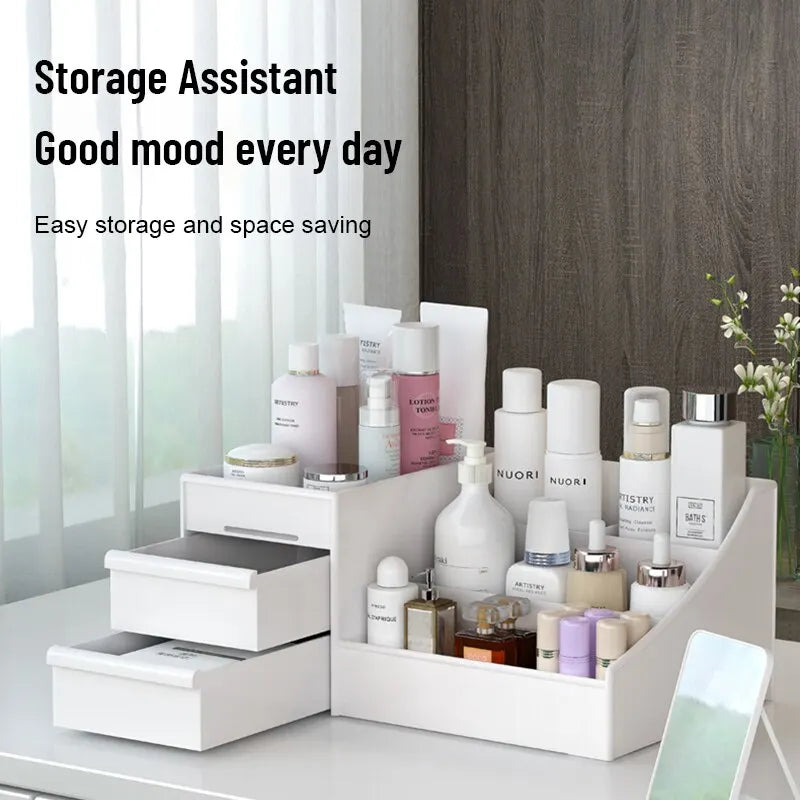 White Blushimmer plastic makeup storage drawer box with multiple compartments on a dressing table for cosmetics and skincare.