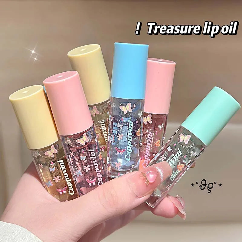 Blushimmer moisturizing shimmer lip gloss with hydrating jelly formula, featuring a mirror-like glaze finish on smooth lips.