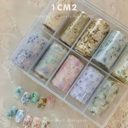Blushimmer nail art transfer paper featuring 10 rolls of plaid, stars, and thousand-bird designs for manicure decoration and decals