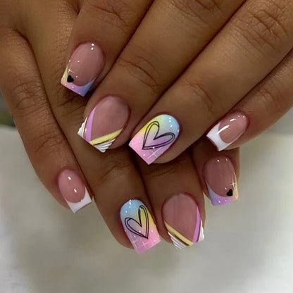 Set of 24 short square fake nails by Blushimmer with halo dyed gradient hearts and colorful French tips design.