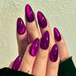 Set of 24 glossy red Cat's Eye press-on nails by Blushimmer, almond shape, full cover nude color, suitable for easy, stylish wear.