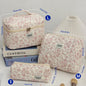Cute quilted cotton makeup bag by Blushimmer featuring zipper closure, portable cloth cosmetic organizer for women and girls.