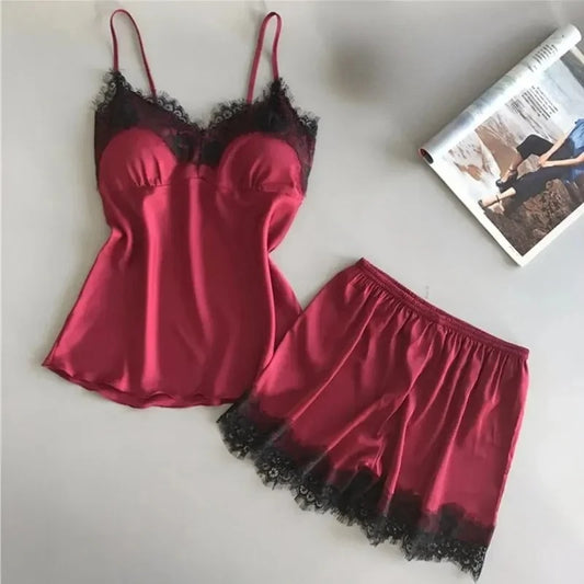 Lace trim satin cami top and pajama set, sleeveless women’s sleepwear with sexy design, smooth fabric, and delicate lace details.