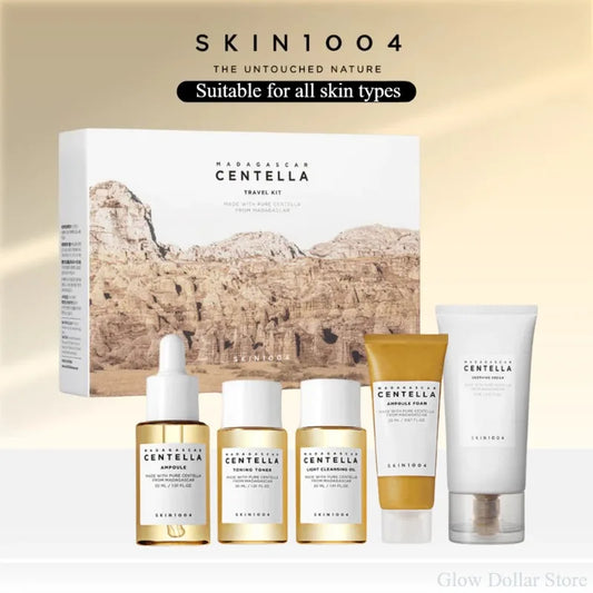 Skincare mini travel kit including toner, ampoule, soothing cream, cleansing oil, and foam from SKIN1004 Madagascar Centella brand