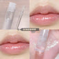 Blushimmer Lip Oil Uuny transparent water gloss with honey, moisturizing lip glaze in a clear glass tube with mirror cap.