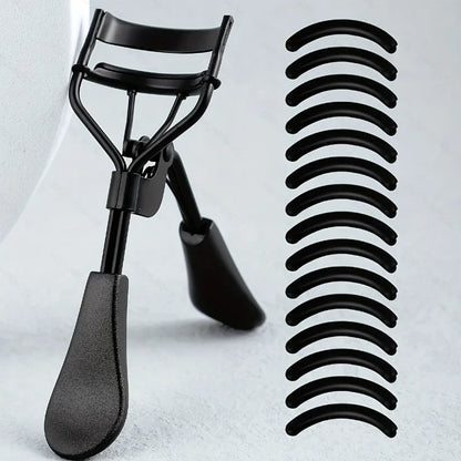 Blushimmer portable eyelash curler with stainless steel body and 15 silicone pads, ideal for eyelash extensions and curling.