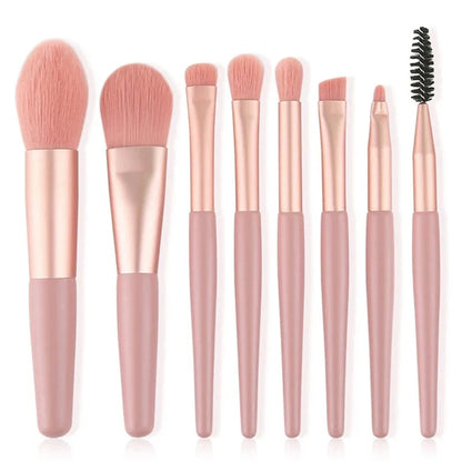Set of 13 Blushimmer makeup brushes including eyeshadow, foundation, blush, and beauty tools in a soft makeup bag.