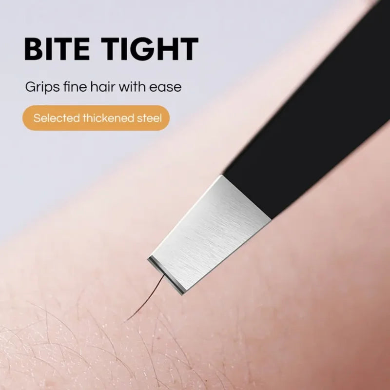 Black stainless steel eyebrow tweezer by Blushimmer with slant and flat points for precise eyebrow shaping and ingrown hair removal.