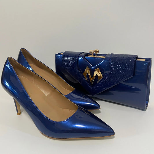 Elegant high heel shoes and matching bag by EdleessFashion, stylish accessories with a sleek design and sophisticated details.