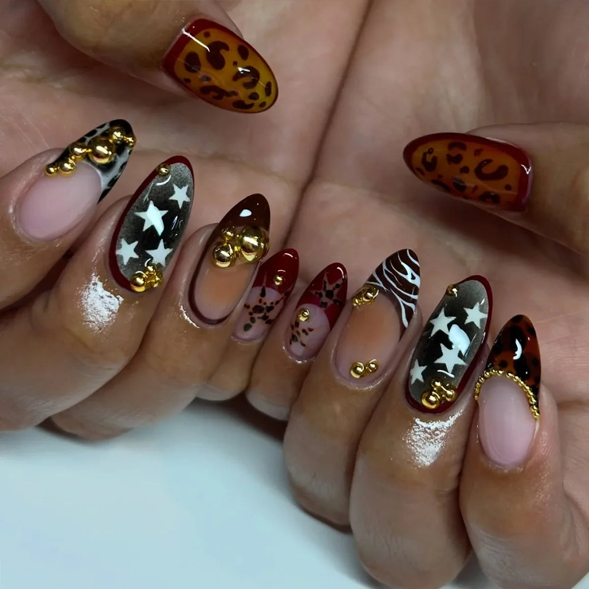 Blushimmer 24-piece wine red almond press-on nails with cartoon rabbit, bowknot, plaid, and pearl designs for girls.
